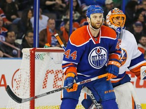 Feb 28, 2016; Edmonton, Alberta, CAN; Edmonton Oilers forward Zack Kassian (44) tries to screen New York Islanders goaltender Jaroslav Halak (41) during the third period at Rexall Place.