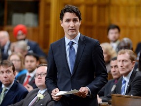 Prime Minister Justin Trudeau addresses the House of Commons on Parliament Hill in Ottawa on Thursday, May 19, 2016. Trudeau apologized for his conduct following an incident in the House Wednesday when he pulled Conservative whip Gord Brown through a clutch of New Democrat MPs. THE CANADIAN PRESS/Adrian Wyld