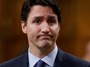 Prime Minister Justin Trudeau pauses while responding to questions after delivering an apology in the House of Commons on Parliament Hill in Ottawa on May 19, 2016 following a physical altercation the previous day. REUTERS/Chris Wattie