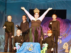 Ursula, played by Hollie Blackburn, convinces Ariel (Gwenyth McKay) to give up her voice in exchange for legs so she can be with Prince Eric on land during a scene from Upper Thames Elementary School's (UTES) performance of The Little Mermaid Operetta May 17. Pictured from left are Brooklyn Gethke, Lauren McKay, Amber Judge, Blackburn, Sadie Josling, Jaimie Badley and Gwenyth McKay. Students put on two shows last Wednesday, May 18 and an encore finale Thursday, May 19. GALEN SIMMONS MITCHELL ADVOCATE