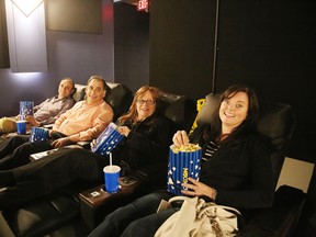David Petryna, left, Greg Haddad, Sandra Haddad and Sandra Petryna relax prior to a movie at the grand opening of  the Downtown Movie Lounge located at the Rainbow Centre  in Sudbury, Ont. on Thursday May 19, 2016. Gino Donato/Sudbury Star/Postmedia Network
