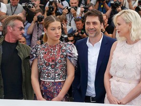 Director Sean Penn, cast members Adele Exarchopoulos, Javier Bardem and Charlize Theron (L to R) pose during a photocall for the film "The Last Face" in competition at the 69th Cannes Film Festival in Cannes, France, May 20, 2016.  REUTERS/Regis Duvignau