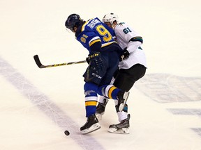 St. Louis Blues right winger Vladimir Tarasenko checks San Jose Sharks defenceman Justin Braun during the first period in Game 2 of the Western Conference final of the NHL playoffs at Scottrade Center in St. Louis on May 17, 2016. (Aaron Doster-USA TODAY Sports)