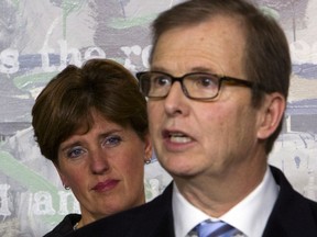 Minister of International Development Marie-Claude Bibeau (left) listens as David Morley, president and CEO of UNICEF Canada, talks to reporters in Ottawa Thursday, Jan. 7, 2016 after Bibeau announced the federal government's extension of the Syrian emergency relief fund deadline. THE CANADIAN PRESS/Fred Chartrand