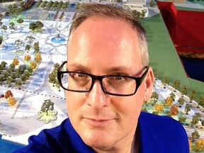 Kingston native  Dave  Bennett, director of talent for Disney Shanghai Resort, with 3-D architectural model of massive 963-acre complex in background. Photo courtesy Dave Bennett.
