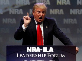 Republican presidential candidate Donald Trump addresses members of the National Rifle Association during their NRA-ILA Leadership Forum during at their annual meeting in Louisville, Kentucky, May 20, 2016. REUTERS/John Sommers II