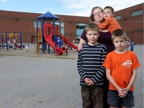 Tanya Hein, seen with her kids, Joshua, Spencer and Elliot at elementary school in Stittsville, hopes there will be a public high school in Stittsville by the time her children are old enough to enrol. (Tony Caldwell/Postmedia)