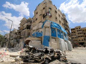 Scores of people, including women, children and the last pediatrician in Aleppo, Syria, died when this hospital was hit by Syrian government air strikes in April. (Abdalrhman Ismail/Reuters)