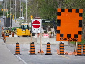 Concrete barriers and construction vehicles block the bridge on Windermere Road, a problem for emergency vehicles accessing University Hospital that are forced to reroute adding minutes to their transport time, in London, Ont. on Friday May 20, 2016. Craig Glover/The London Free Press/Postmedia Network