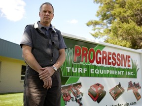 Luke Janmaat, president and co-founder of Progressive Turf Equipment, poses for a photo in front of his facility in Seaforth May 17. (Photo taken by Justin Prince)