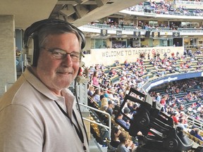 Chris Dahl takes his position behind the camera for Wednesday night’s Blue Jays game at Target Field in Minneapolis.
