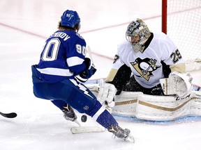 Marc-Andre Fleury of the Pittsburgh Penguins makes a save on Tampa Bay’s Vladislav Namestnikov during in Game 4 of the Eastern Conference final at Amalie Arena on May 20, 2016 in Tampa, Florida. (Mike Carlson/Getty Images/AFP)