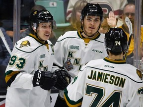 London Knights forward Mitchell Marner, left, celebrates his goal with teammates Matthew Tkachuk, centre, and Aiden Jamieson during Memorial Cup action against the Red Deer Rebels in Red Deer, Friday, May 20, 2016. (THE CANADIAN PRESS/Jeff McIntosh)