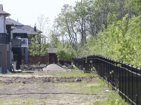 Some residents of South Winnipeg are frustrated by the lack of landscaping being done by the city.  A dry fountain is one aspect of this dispute.  Saturday, May 21, 2016.  Sun/Postmedia Network