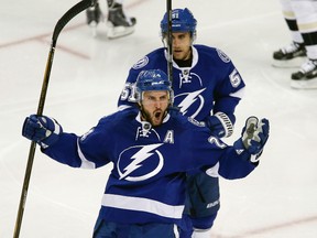 Lightning right wing Ryan Callahan (24) celebrates a goal with centre Valtteri Filppula (51) during the first period in Game 4 of the Eastern Conference final at Amalie Arena in Tampa, Fla., on Friday, May 20, 2016. (Reinhold Matay/USA TODAY Sports)