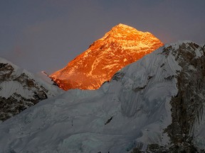 In this Nov. 12, 2015, file photo, Mount Everest is seen from the way to Kalapatthar in Nepal. (AP Photo/Tashi Sherpa, File)