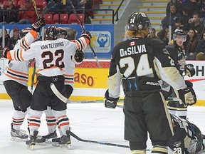 Lloydminster Bobcats players celebrate; TGH players are dejected, during Saturday night playoff action at the RBC Cup in Lloydminster, AB/SK. (RBC Cup photo)