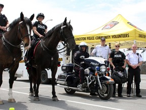 Member of the Kingston Police collecting unused or expired prescription medication at the Memorial Centre in Kingston, Ont. on Saturday May 21, 2016. Steph Crosier/Kingston Whig-Standard/Postmedia Network