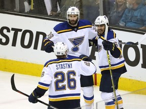Troy Brouwer of the St. Louis Blues celebrates with Paul Stastny and Robby Fabbri after his goal against the San Jose Sharks in game four of the Western Conference Finals during the 2016 NHL Stanley Cup Playoffs at SAP Center on May 21, 2016 in San Jose, California.  (Sean M. Haffey/Getty Images/AFP)