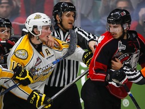 Brandon Wheat Kings' Nolan Patrick, left, and Rouyn-Noranda Huskies' Anthony-John Greer are separated as they scuffle during third period CHL Memorial Cup hockey action in Red Deer, Saturday, May 21, 2016.THE CANADIAN PRESS/Jeff McIntosh