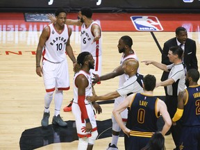 Cleveland Cavaliers forward LeBron James is hit in Toronto, Ont. on Saturday May 21, 2016. TheToronto Raptors take on  the Cleveland Cavaliers in game 3 of the Eastern conference finals of the NBA Playoffs at the Air Canada Centre. (Veronica Henri/Toronto Sun/Postmedia Network)