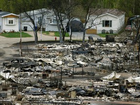 Homes in Fort McMurray were devastated by a massive wildfire that forced the entire evacuation of Alberta's fourth largest city.
