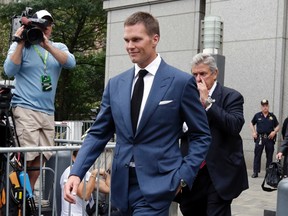 In this Monday, Aug. 31, 2015, file photo, New England Patriots quarterback Tom Brady leaves federal court, in New York. Brady will appeal his four-game suspension imposed by the NFL. NFL Players Association attorney Theodore B. Olson told ABC News on Monday morning, May 23, 2016, in an interview aired on "Good Morning America" that they plan to file the appeal later today. (AP Photo/Richard Drew, File)