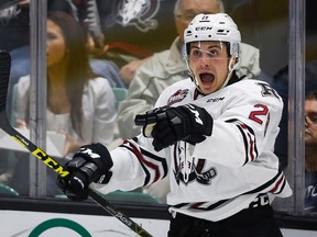 Red Deer Rebels' Adam Helewka celebrates his goal during second period CHL Memorial Cup hockey action against the Rouyn-Noranda Huskies in Red Deer, Alta., Sunday, May 22, 2016. THE CANADIAN PRESS/Jeff McIntosh