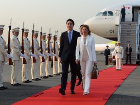 Prime Minister Justin Trudeau and his wife Sophie Gregoire Trudeau are greeted by an honour guard as they arrive in Tokyo, Japan on Monday, May 23, 2016. THE CANADIAN PRESS/Sean Kilpatrick