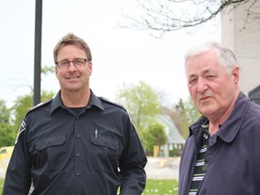 Neil Bowen/Sarnia ObserverSgt. John Pearce (left) and Sarnia Police Chief Phil Nelson helped in the collection of medication for safe disposal during a Prescription Drop-Off Day Saturday at Sarnia police headquarters.
