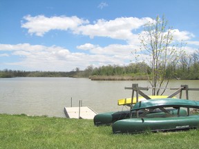 With the isolated appearance of the lake at the Lorne C. Henderson Conservation Area, it's hard to believe it's only a short drive to the urban centres of both Petrolia and Sarnia. (Don Robinet/Postmedia Network)