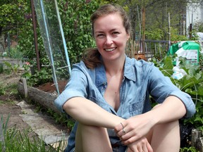 Lilith Wyatt, Food Access Co-ordinator with Loving Spoonful, at the Elmwood Community Garden on Saturday. (Steph Crosier/The Whig-Standard)