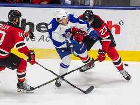 Like the rest of his Marlies teammates, forward Brendan Leipsic, here battling Albany’s Vojtech Mozik in the previous round, is finding the goals not as easy to come by in the playoffs. (Ernest Doroszuk, Toronto Sun)
