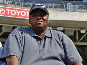 Tony Gwynn's widow and two children filed a lawsuit Monday seeking to hold the tobacco industry accountable for the Hall of Famer's death nearly two years ago. (Lenny Ignelzi/AP Photo/Files)