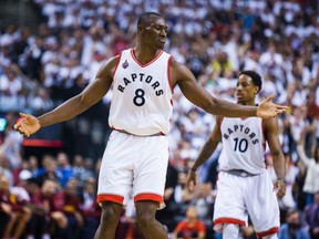 Raptors centre Bismack Biyombo (front) gestures while DeMar DeRozan looks on against the Cavaliers during first half action in Game 4 of the Eastern Conference final in Toronto on Monday, May 23, 2016. (Ernest Doroszuk/Toronto Sun)