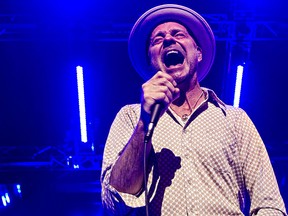 Gord Downie of the Tragically Hip performs at Rexall Place in Edmonton on Thursday, Feb. 12, 2015. (Codie McLachlan/Postmedia Network)