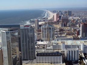 This March 7, 2012 photo shows casinos along the Atlantic City, N.J. beachfront.  Even before state leaders reached a deal to rescue the struggling resort on Monday, city officials were trying to convince visitors that its severe financial problems won't affect anyone's ability to gamble, or to spend money on food, drink or shopping.  (AP Photo/Wayne Parry)