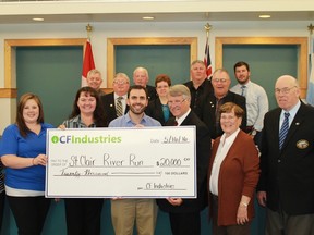 Members of CF Industries present a cheque to the St. Clair River Run committee and St. Clair Township during council's May 16 meeting. 
CARL HNATYSHYN/SARNIA THIS WEEK