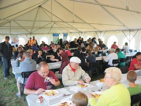 The crowd digs into their meals at one of the previous annual Breakfast on the Farm events held in Lambton County. This year's breakfast and farm tour is set for June 18. (Handout/Sarnia Observer/Postmedia Network)