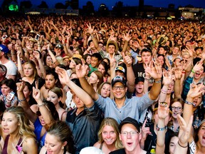 Fans get excited for Lady Antebellum before they came on the Bell Stage Sunday July 6, 2014 at Bluesfest held at LeBreton Flats. Ashley Fraser / Postmedia