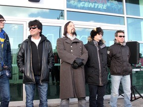 Members of Kingston's The Tragically Hip Gord Downie, left to right, Paul Langlois, Rob Baker, Johnny Fay and Gord Sinclair during a ceremony officialy renaming Barrack Street in front of the Rogers K-Rock Centre to The Tragically Hip Way in 2013. (Ian MacAlpine/Whig-Standard file photo