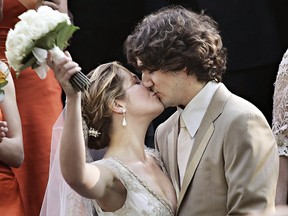 Justin Trudeau kisses his new bride Sophie Gregoire after their marriage ceremony in Montreal on May 28, 2005. When Trudeau announced that he and his wife Sophie Gregoire Trudeau would take Wednesday off to celebrate their wedding anniversary during a visit to Japan, critics immediately jumped on the micro-vacation as another example of Liberal entitlement. THE CANADIAN PRESS/Ryan Remiorz