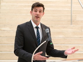 Edmonton Mayor Don Iveson posts the first #yegyimby tweet during a press conference on future of affordable housing, at City Hall in Edmonton Alta. on Tuesday May 24, 2016. Photo by David Bloom