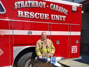 A member of the Strathroy-Caradoc heavy rescue unit holds the new hydraulic spreaders recently purchased by the local fire department. Photo Courtesy of the Strathroy-Caradoc Fire Department.