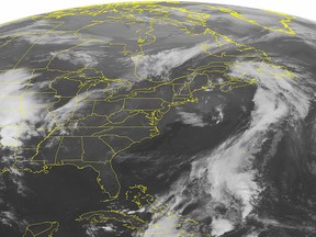 This NOAA satellite image taken Wednesday, May 25, 2016 at 12:45 AM EDT shows a pesky area of low pressure exiting New England.  (NOAA/Weather Underground via AP)