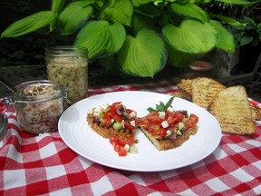 This Sunday, May 22, 2016 photo, shows salmon salad in a jar, left, next to the white bean salad and chopped greek salad on grilled bread in New York. This recipe spells out three different toppings, all vaguely Mediterranean: a white bean salad with fresh fennel thickened with mashed beans so that the filling sticks to the bread; smoked salmon rillettes, finely-chopped salmon flavored with capers, lemon and fresh herbs and bound with sour cream; and a chopped Greek salad. (AP Photo/Sara Moulton)