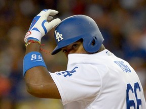 Los Angeles Dodgers right fielder Yasiel Puig at bat in the fourth inning of the game against the Cincinnati Reds at Dodger Stadium in Los Angeles on May 24, 2016. (Jayne Kamin-Oncea/USA TODAY Sports)