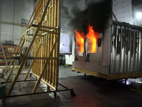 Burn experiment in the fire laboratory on the grounds of the NRC'S lab in Mississippi Mills.