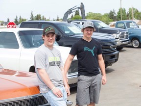 Grade 10 St. Jerome's Catholic School student's Chase Mcfarlane and Kyler Carson at their Show and Shine fundraiser on Thursday, May 19. Taylor Hermiston/Vermilion Standard/Postmedia Network.