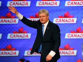 Former Prime Minister Stephen Harper waves as he walks off the stage after giving his concession speech following the federal election in Calgary on October 19, 2015. At the Tory convention in Vancouver on Thursday, the party will give a salute to the Harper years. REUTERS/Mark Blinch/File Photo